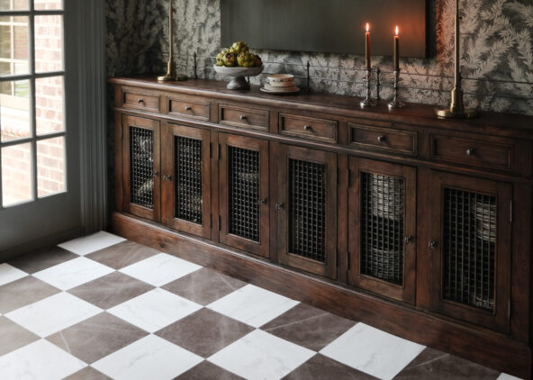 Bronze & white marble effect peel-and-stick floor tiles in a moody dining room