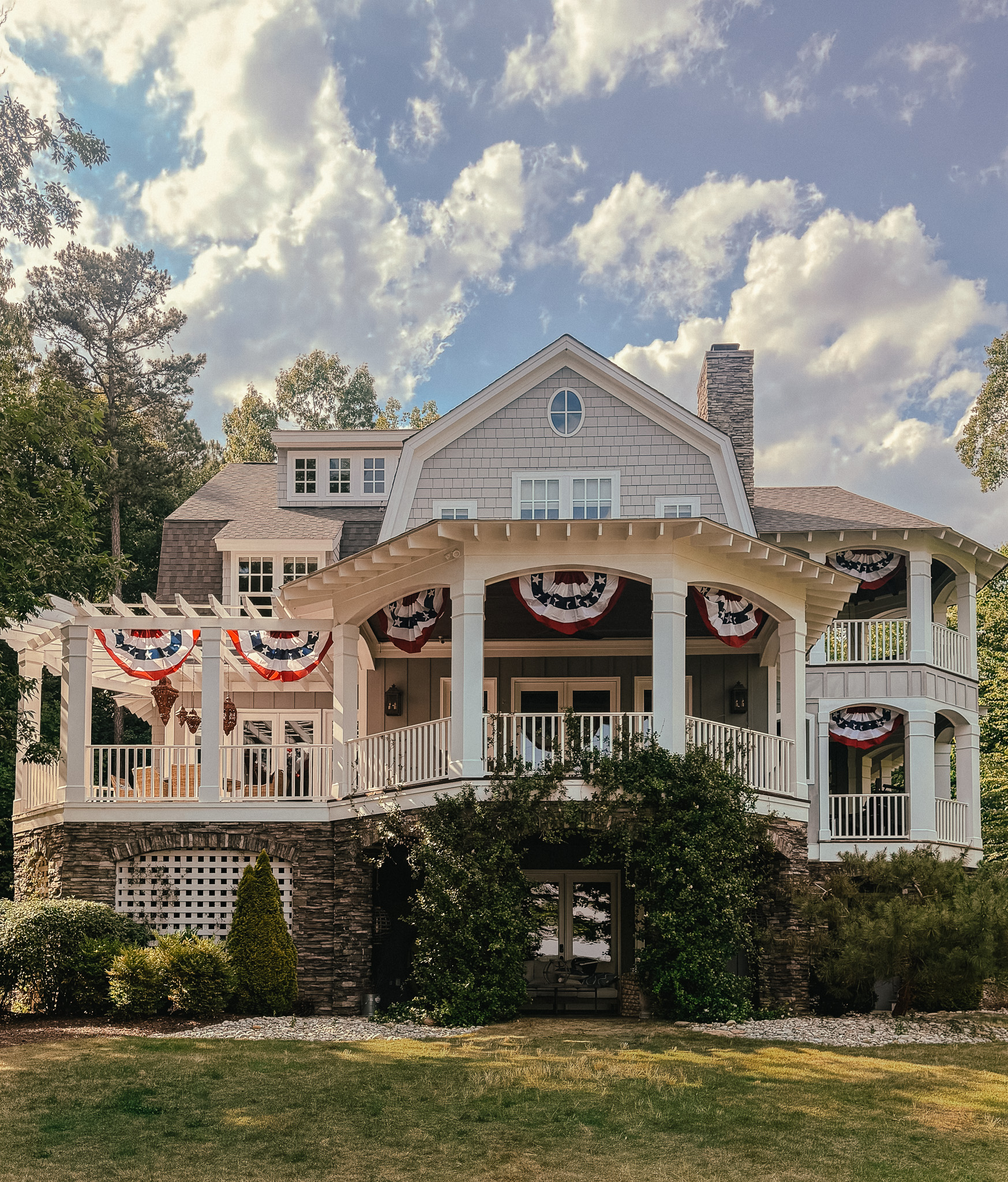 Merrimore Lake House with American flag pendants