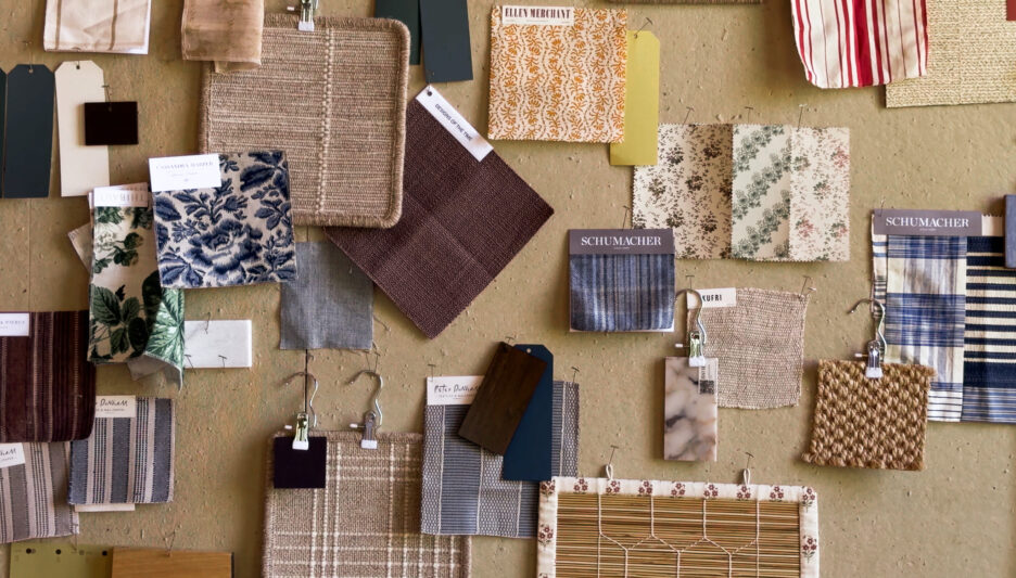 Elegant fabric swatches and upholstery samples arranged on a corkboard for interior design ideas and home renovation projects.