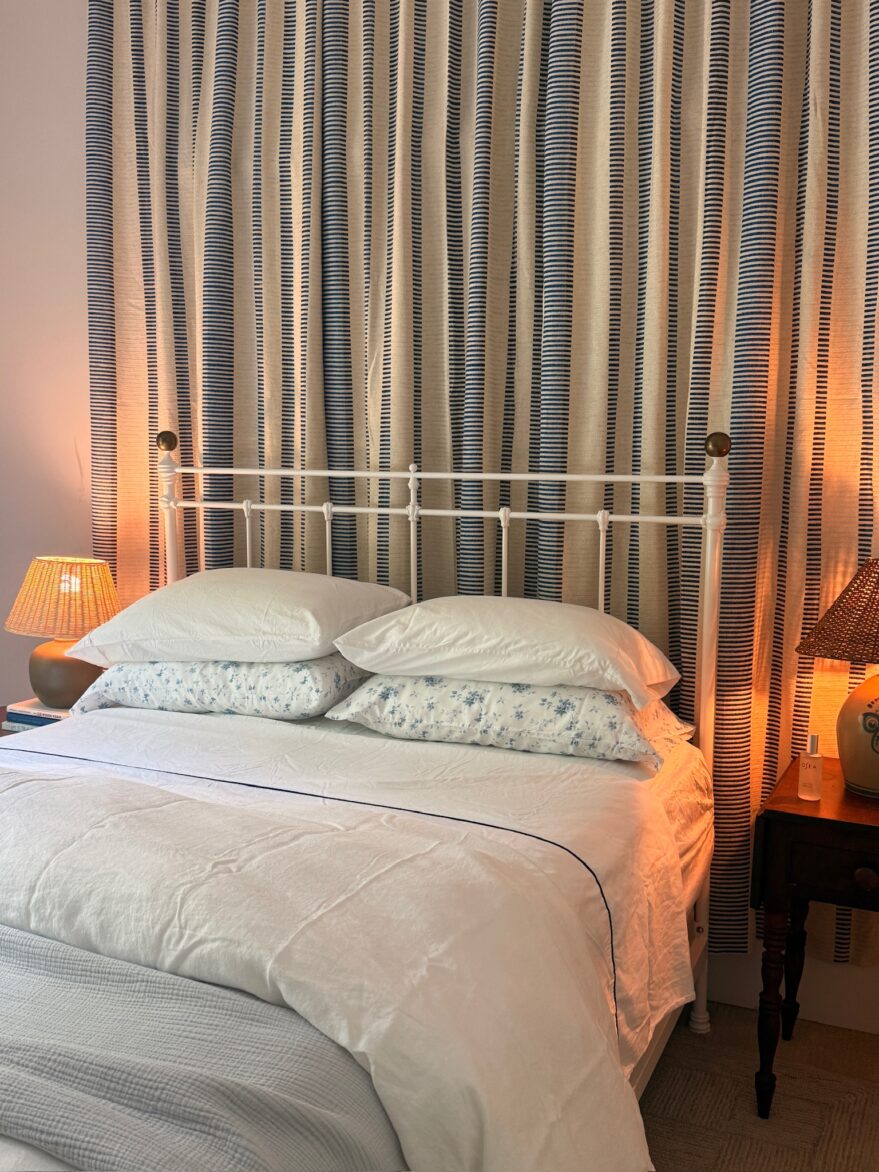 Guest room with cozy lamps, pillow mist, fluffy duvets